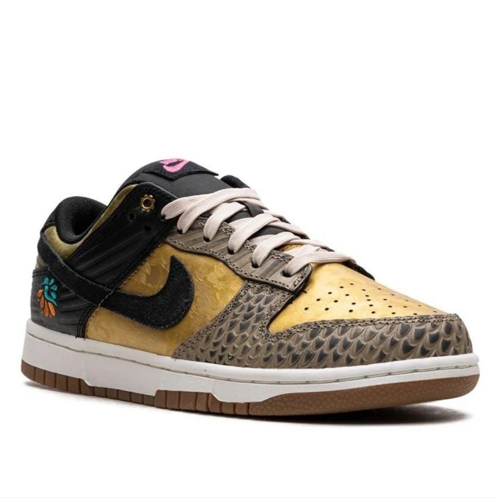 Nike Black and Gold Athletic Shoes with Distinctive Design